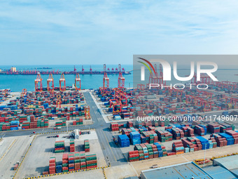 A photo taken on November 7, 2024, shows a working scene at the container terminal of Rizhao Port in Rizhao, China. (