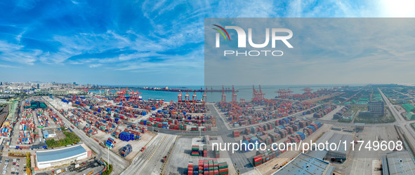 A photo taken on November 7, 2024, shows a working scene at the container terminal of Rizhao Port in Rizhao, China. 