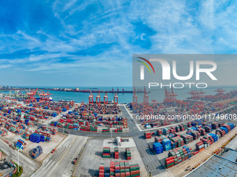 A photo taken on November 7, 2024, shows a working scene at the container terminal of Rizhao Port in Rizhao, China. (