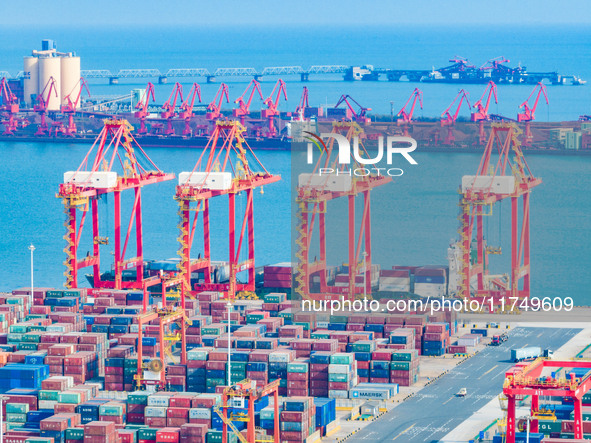 A photo taken on November 7, 2024, shows a working scene at the container terminal of Rizhao Port in Rizhao, China. 