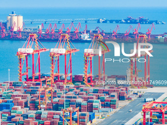 A photo taken on November 7, 2024, shows a working scene at the container terminal of Rizhao Port in Rizhao, China. (