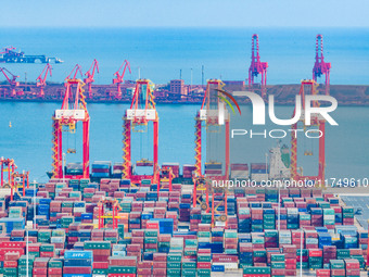 A photo taken on November 7, 2024, shows a working scene at the container terminal of Rizhao Port in Rizhao, China. (