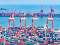 A photo taken on November 7, 2024, shows a working scene at the container terminal of Rizhao Port in Rizhao, China. (