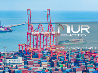 A photo taken on November 7, 2024, shows a working scene at the container terminal of Rizhao Port in Rizhao, China. (