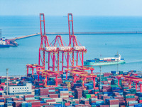 A photo taken on November 7, 2024, shows a working scene at the container terminal of Rizhao Port in Rizhao, China. (