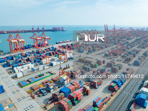 A photo taken on November 7, 2024, shows a working scene at the container terminal of Rizhao Port in Rizhao, China. 