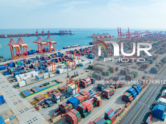 A photo taken on November 7, 2024, shows a working scene at the container terminal of Rizhao Port in Rizhao, China. (