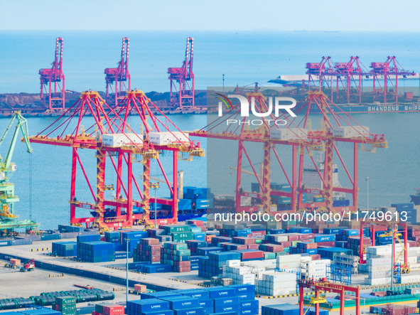 A photo taken on November 7, 2024, shows a working scene at the container terminal of Rizhao Port in Rizhao, China. 