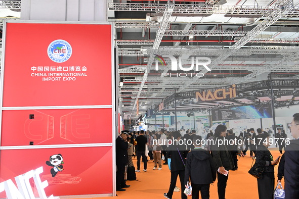 Visitors visit the NACHI exhibition area during the technical equipment exhibition area of the 7th China International Import Expo in Shangh...