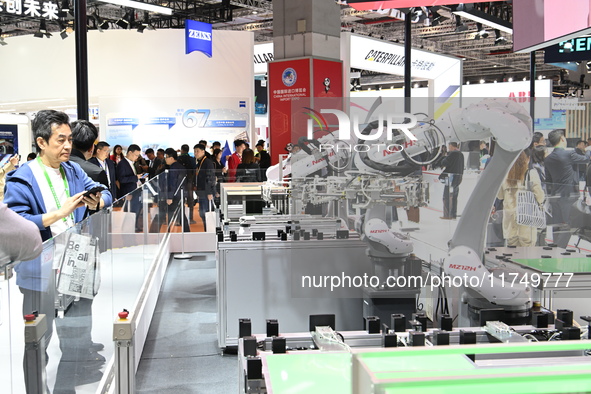 Robots in the fields of industry, medical treatment, science, and technology are displayed in the Technical Equipment Exhibition area of the...