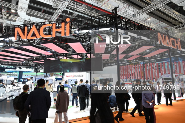 Visitors visit the NACHI exhibition area during the technical equipment exhibition area of the 7th China International Import Expo in Shangh...