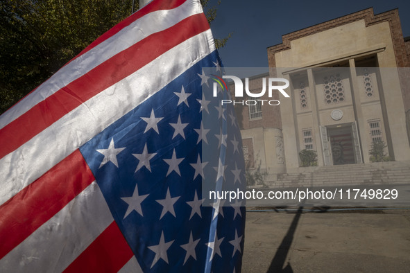 The U.S. flag hangs upside down at the former U.S. embassy in Tehran, Iran, on November 7, 2024. Former U.S. President and Republican candid...