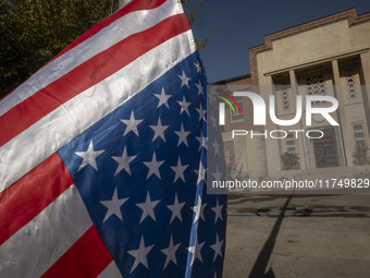 The U.S. flag hangs upside down at the former U.S. embassy in Tehran, Iran, on November 7, 2024. Former U.S. President and Republican candid...