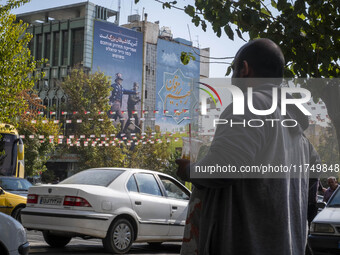 An anti-U.S. and Israeli banner hangs from a wall of a governmental building in downtown Tehran, Iran, on November 7, 2024. Former U.S. Pres...