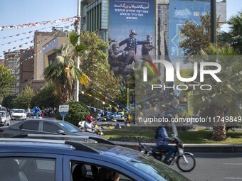 An anti-U.S. and Israeli banner hangs from a wall of a governmental building in downtown Tehran, Iran, on November 7, 2024. Former U.S. Pres...