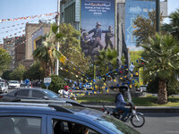 An anti-U.S. and Israeli banner hangs from a wall of a governmental building in downtown Tehran, Iran, on November 7, 2024. Former U.S. Pres...