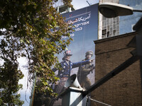 An anti-U.S. and Israeli banner hangs from a wall of a governmental building in downtown Tehran, Iran, on November 7, 2024. Former U.S. Pres...