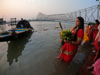 A Hindu devotee offers prayers to the sun god during The Chhath Festival at the Ganga ghat in Kolkata, India, on November 7, 2024. The Chhat...