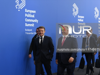 Emmanuel Macron, President of France, arrives with Viktor Orban, Hungarian Prime Minister, at the 5th European Political Community Summit in...