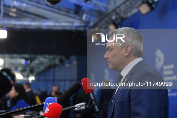 Karl Nehammer, Chancellor of Austria, arrives at the 5th European Political Community Summit in Budapest, Hungary, on November 7. This occur...