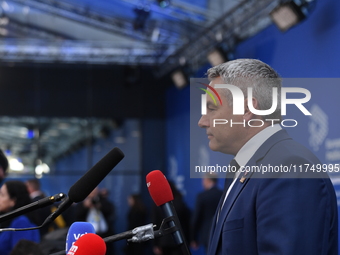 Karl Nehammer, Chancellor of Austria, arrives at the 5th European Political Community Summit in Budapest, Hungary, on November 7. This occur...