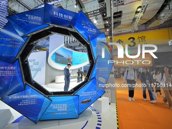 Visitors visit the Brightmorrow school food booth at the 7th CIIE in Shanghai, China, on November 7, 2024. (