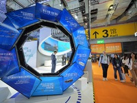 Visitors visit the Brightmorrow school food booth at the 7th CIIE in Shanghai, China, on November 7, 2024. (