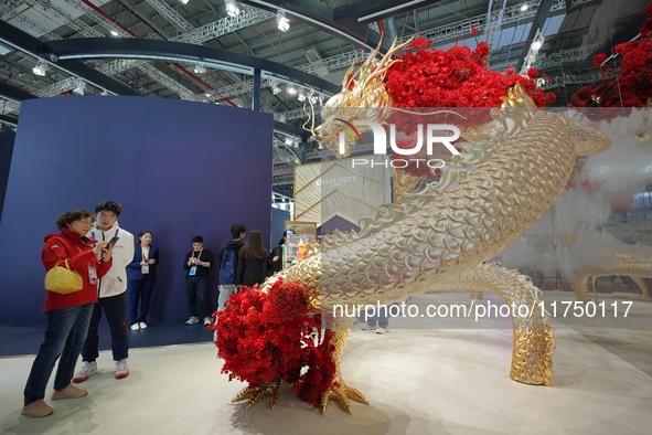 Visitors visit the Guerlain booth at the 7th CIIE in Shanghai, China, on November 7, 2024. 