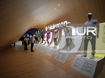 Visitors visit the Lululemon booth at the 7th CIEXPO in Shanghai, China, on November 7, 2024. (