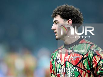 Tommy Setford of Arsenal looks on during the UEFA Champions League 2024/25 League Phase MD4 match between FC Internazionale and Arsenal at S...