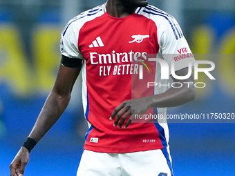 Thomas Partey of Arsenal looks on during the UEFA Champions League 2024/25 League Phase MD4 match between FC Internazionale and Arsenal at S...