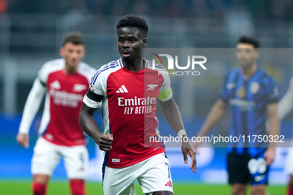 Bukayo Saka of Arsenal looks on during the UEFA Champions League 2024/25 League Phase MD4 match between FC Internazionale and Arsenal at Sta...