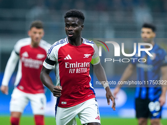 Bukayo Saka of Arsenal looks on during the UEFA Champions League 2024/25 League Phase MD4 match between FC Internazionale and Arsenal at Sta...