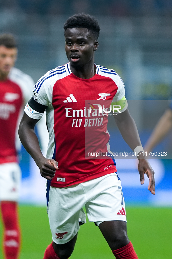 Bukayo Saka of Arsenal looks on during the UEFA Champions League 2024/25 League Phase MD4 match between FC Internazionale and Arsenal at Sta...