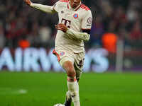 Jamal Musiala of Bayern Munich  controls the ball during the Champions League Round 4 match between Bayern Munich v Benfica at the Allianz a...