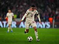 Jamal Musiala of Bayern Munich  controls the ball during the Champions League Round 4 match between Bayern Munich v Benfica at the Allianz a...