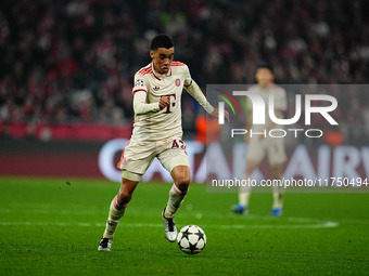 Jamal Musiala of Bayern Munich  controls the ball during the Champions League Round 4 match between Bayern Munich v Benfica at the Allianz a...