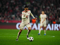 Jamal Musiala of Bayern Munich  controls the ball during the Champions League Round 4 match between Bayern Munich v Benfica at the Allianz a...