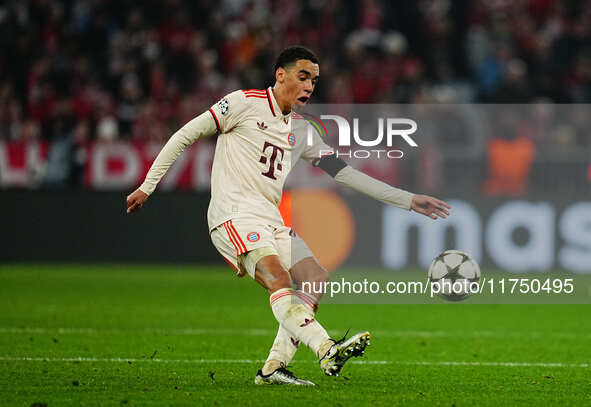 Jamal Musiala of Bayern Munich  controls the ball during the Champions League Round 4 match between Bayern Munich v Benfica at the Allianz a...