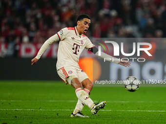 Jamal Musiala of Bayern Munich  controls the ball during the Champions League Round 4 match between Bayern Munich v Benfica at the Allianz a...