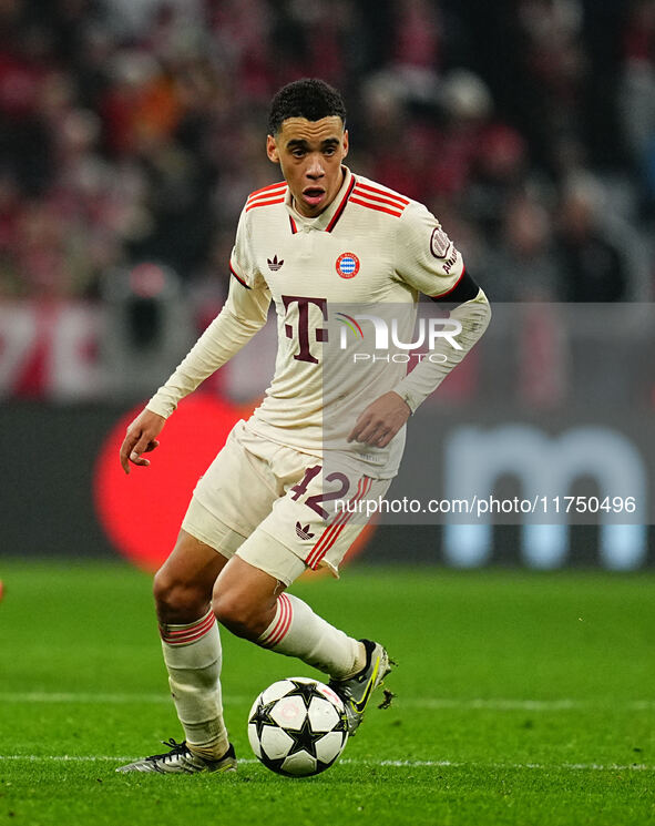 Jamal Musiala of Bayern Munich  controls the ball during the Champions League Round 4 match between Bayern Munich v Benfica at the Allianz a...