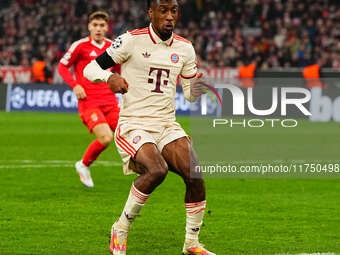 Kingsley Coman of Bayern Munich  controls the ball during the Champions League Round 4 match between Bayern Munich v Benfica at the Allianz...