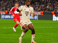 Kingsley Coman of Bayern Munich  controls the ball during the Champions League Round 4 match between Bayern Munich v Benfica at the Allianz...