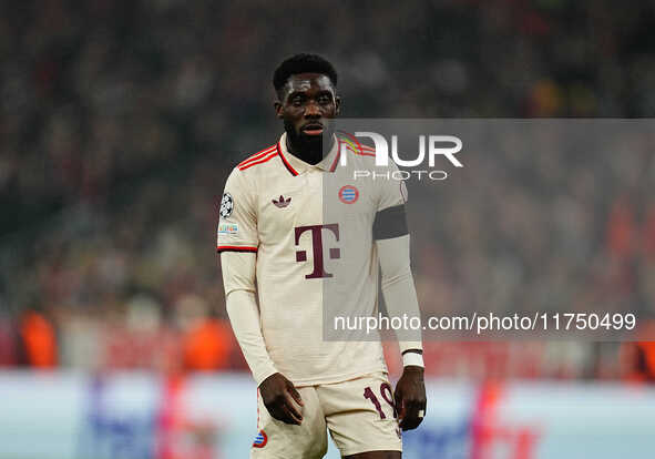 Alphonso Davies of Bayern Munich  looks on during the Champions League Round 4 match between Bayern Munich v Benfica at the Allianz arena, M...