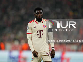 Alphonso Davies of Bayern Munich  looks on during the Champions League Round 4 match between Bayern Munich v Benfica at the Allianz arena, M...