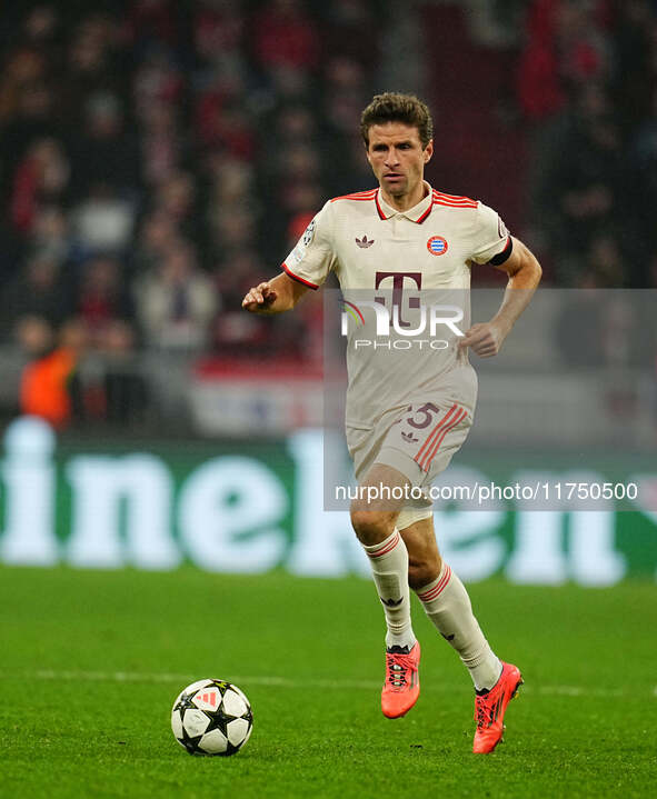 Thomas Muller of Bayern Munich  controls the ball during the Champions League Round 4 match between Bayern Munich v Benfica at the Allianz a...