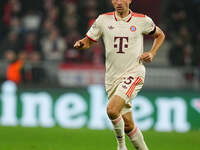 Thomas Muller of Bayern Munich  controls the ball during the Champions League Round 4 match between Bayern Munich v Benfica at the Allianz a...