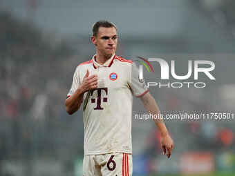 Joshua Kimmich of Bayern Munich  looks on during the Champions League Round 4 match between Bayern Munich v Benfica at the Allianz arena, Mu...