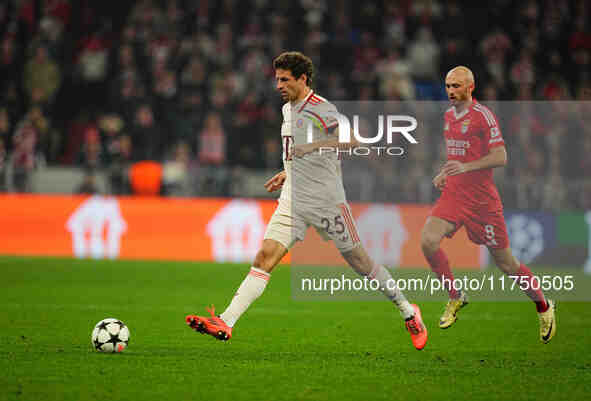 Thomas Muller of Bayern Munich  controls the ball during the Champions League Round 4 match between Bayern Munich v Benfica at the Allianz a...