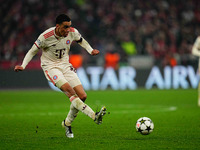 Jamal Musiala of Bayern Munich  controls the ball during the Champions League Round 4 match between Bayern Munich v Benfica at the Allianz a...